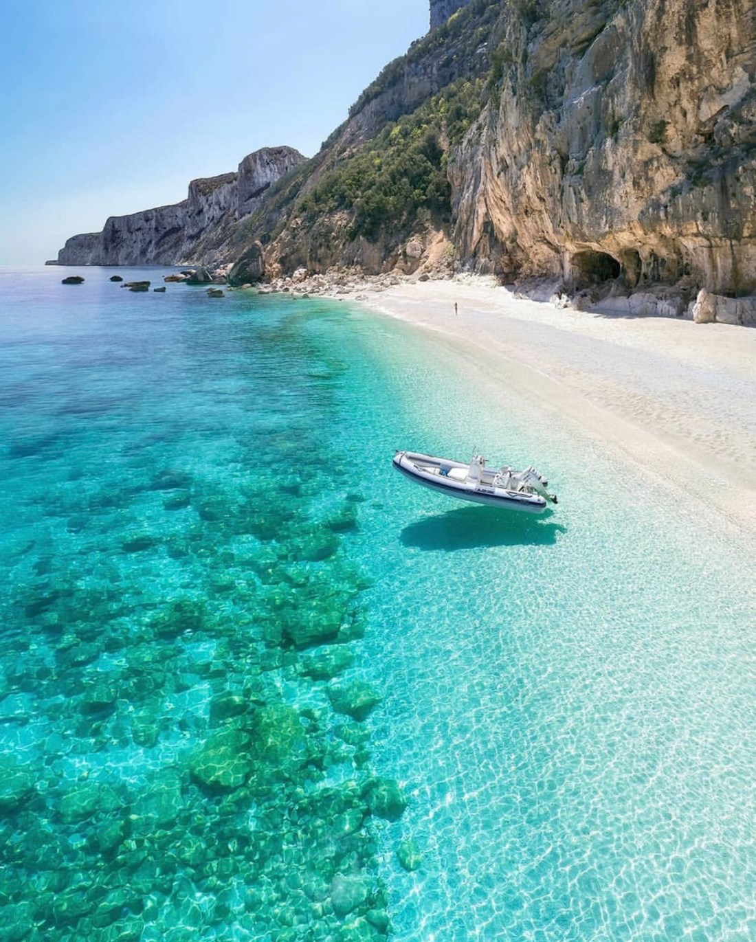 Sardinia is famous for it's crystal clear waters and is one of the best places to visit in Italy if you want to enjoy the mediterranean! 